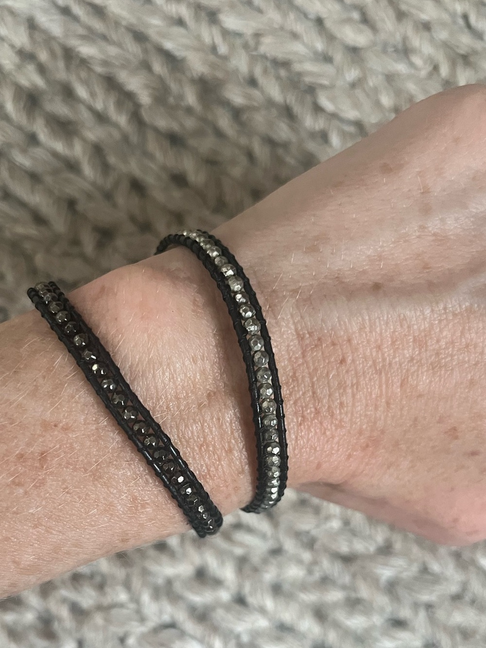 AE metallic bead and leather bracelets